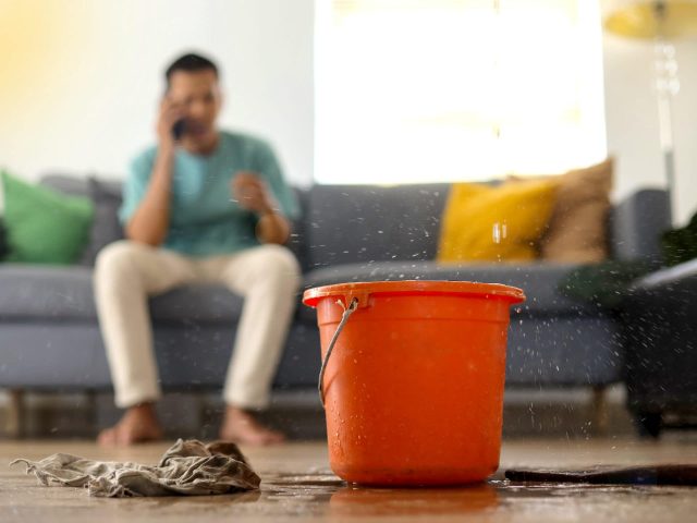 Emergency Roof Leaking Damage Water Leak Or Flood From Ceiling at Living Room